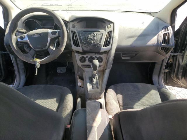 Foto 8 de la subasta – 2014 FORD FOCUS SE con VIN 1FADP3K28EL302970