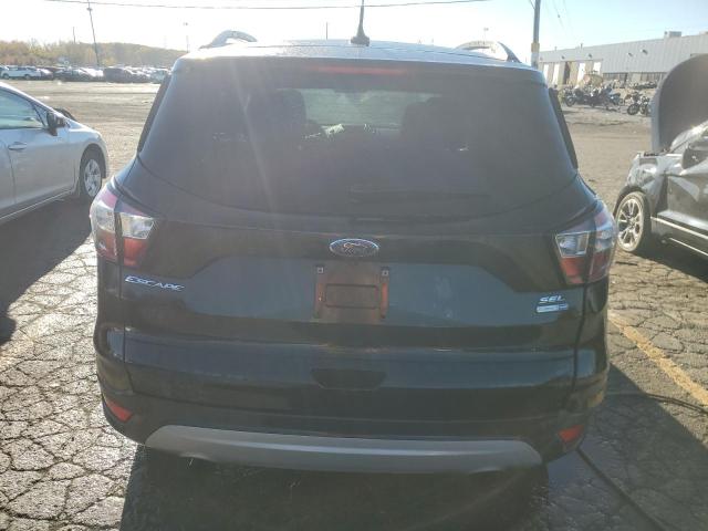 Photo 6 from auction – 2018 FORD ESCAPE SEL with VIN 1FMCU9HD7JUB70634