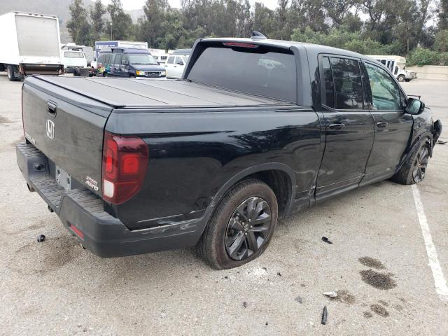Photo 3 from auction – 2021 HONDA RIDGELINE with VIN 5FPYK3F12MB010719