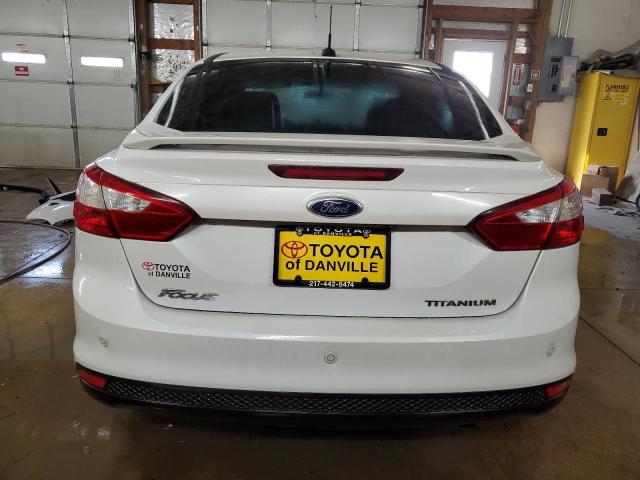 Photo 6 from auction – 2014 FORD FOCUS TITA with VIN 1FADP3J22EL223148