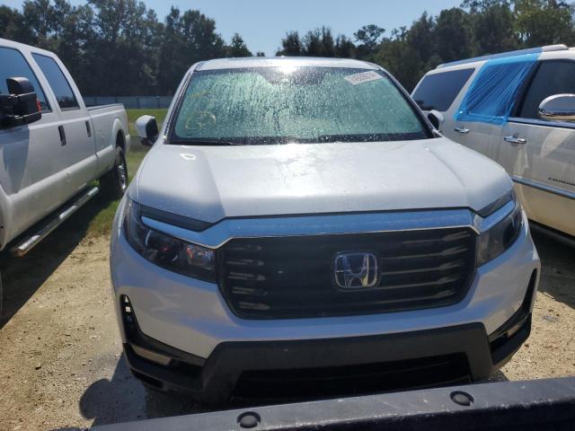 Photo 5 from auction – 2022 HONDA RIDGELINE with VIN 5FPYK3F77NB022290