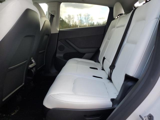 Photo 11 from auction – 2023 TESLA MODEL Y with VIN 7SAYGAEE6PF827170