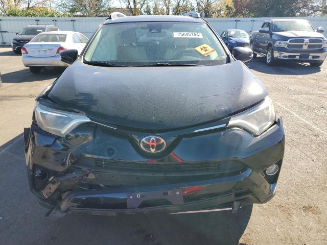 Photo 5 from auction – 2017 TOYOTA RAV4 XLE with VIN 2T3RFREV5HW637892