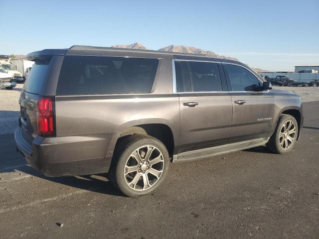 Photo 3 from auction – 2016 CHEVROLET SUBURBAN K with VIN 1GNSKHKC8GR220038