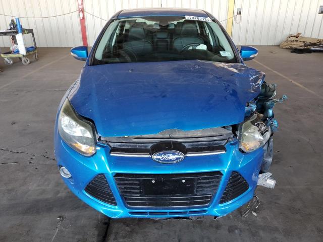 Photo 5 from auction – 2012 FORD FOCUS TITA with VIN 1FAHP3N23CL403411