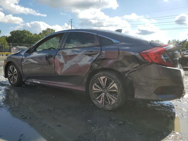 Photo 2 from auction – 2018 HONDA CIVIC EX with VIN JHMFC1F42JX002390