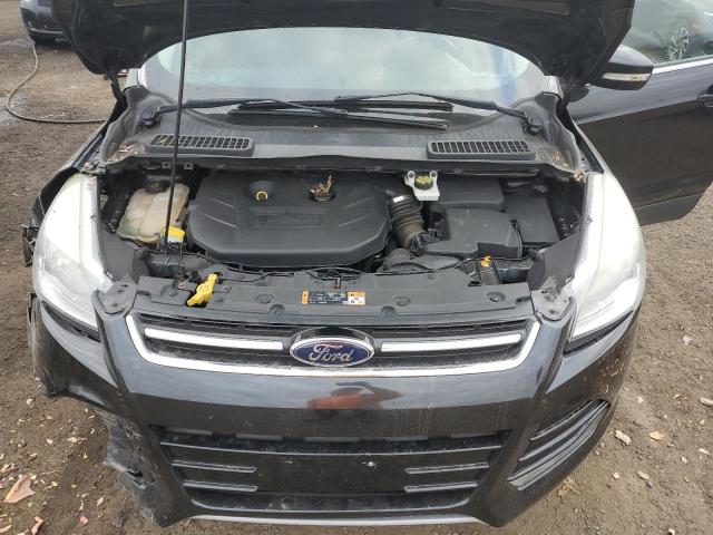 Photo 12 from auction – 2015 FORD ESCAPE TIT with VIN 1FMCU9J9XFUA35158