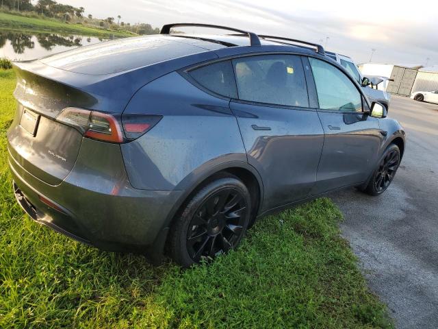 Photo 3 from auction – 2023 TESLA MODEL Y with VIN 7SAYGAEE0PF591891