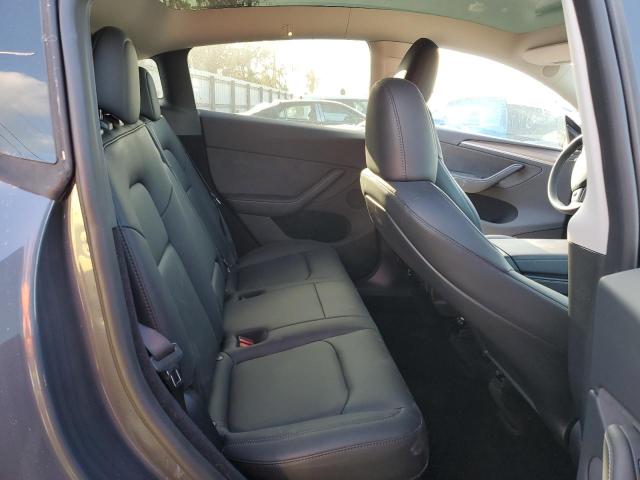 Photo 11 from auction – 2023 TESLA MODEL Y with VIN 7SAYGDEE1PA211410
