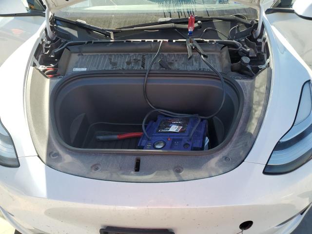 Photo 11 from auction – 2021 TESLA MODEL Y with VIN 5YJYGDEEXMF265333