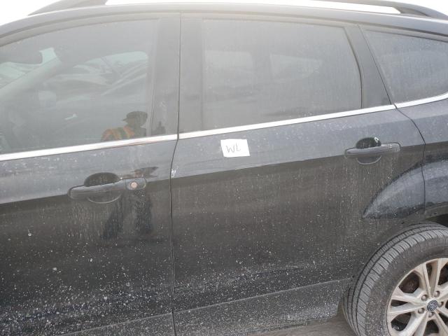 Photo 13 from auction – 2018 FORD ESCAPE SE with VIN 1FMCU0GDXJUA79547