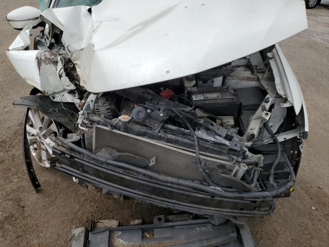 Photo 12 from auction – 2015 NISSAN ROGUE S with VIN 5N1AT2MT5FC918017