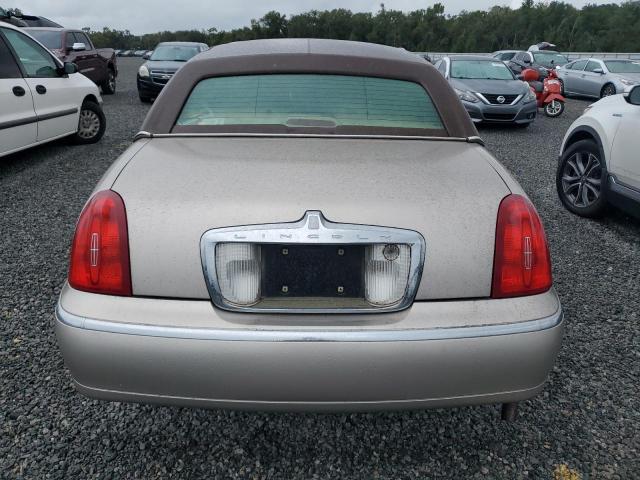 Photo 6 from auction – 1999 LINCOLN TOWN CAR E with VIN 1LNHM81W2XY648066