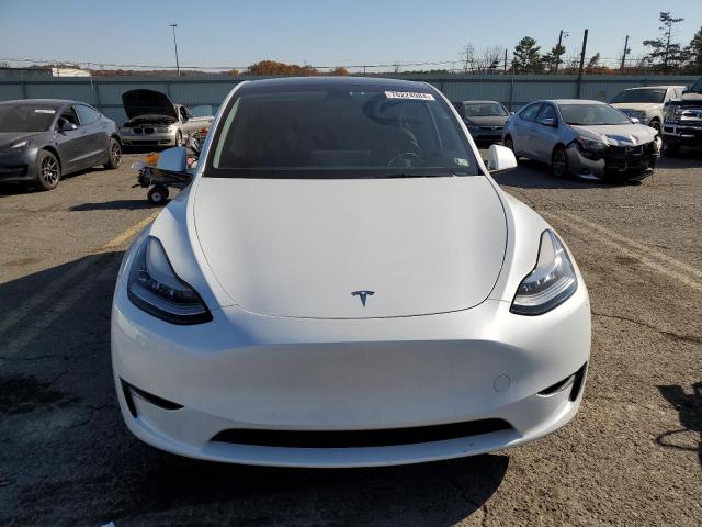 Photo 5 from auction – 2023 TESLA MODEL Y with VIN 7SAYGDEE0PA051858
