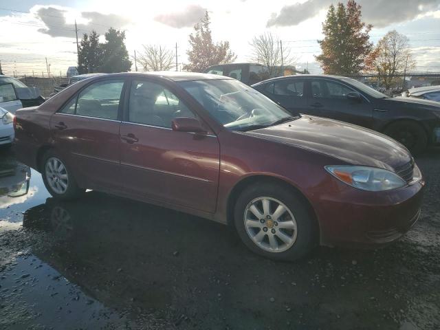 Photo 4 from auction – 2002 TOYOTA CAMRY LE with VIN 4T1BF30K42U007017