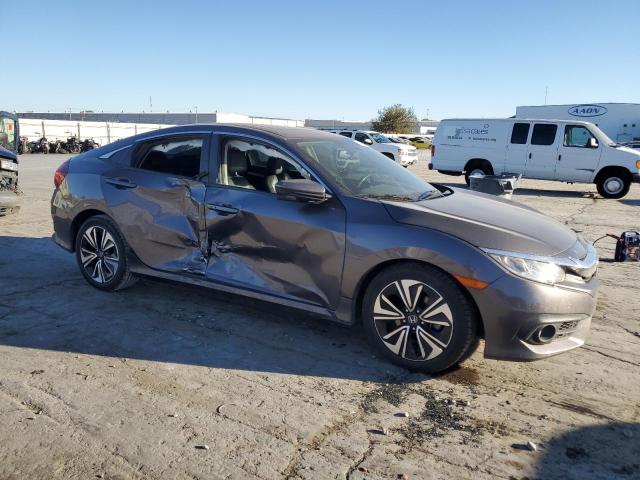 Photo 4 from auction – 2018 HONDA CIVIC EXL with VIN JHMFC1F76JX001107