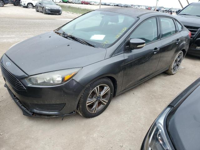 FORD FOCUS SE 2016 with VIN 1FADP3FE9GL287869 - Photo from auction