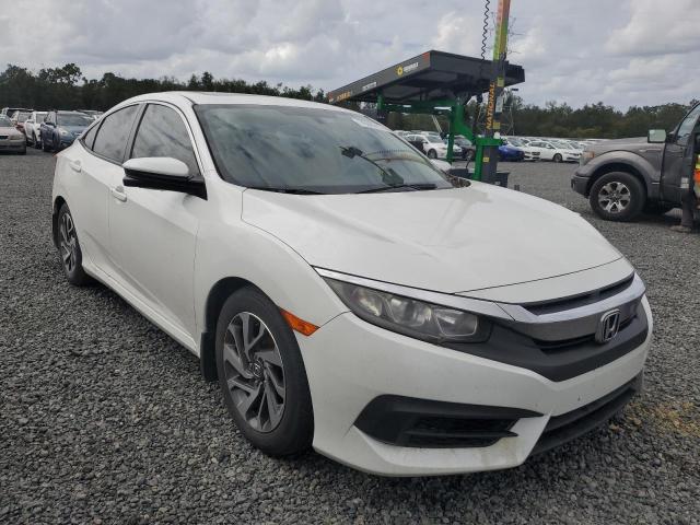 Photo 4 from auction – 2018 HONDA CIVIC EX with VIN 19XFC2F79JE023965
