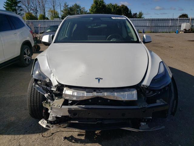 Photo 5 from auction – 2023 TESLA MODEL Y with VIN 7SAYGDEE7PF597317