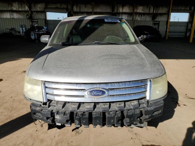 Photo 5 from auction – 2009 FORD TAURUS LIM with VIN 1FAHP25W99G123958