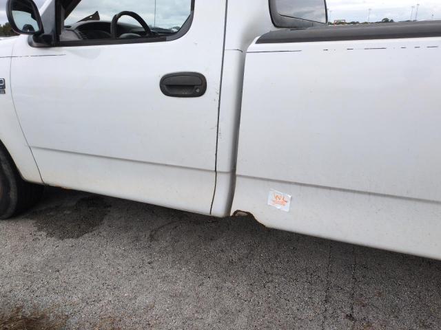 Photo 12 from auction – 2003 FORD F150 with VIN 1FTRF17W03NA02988