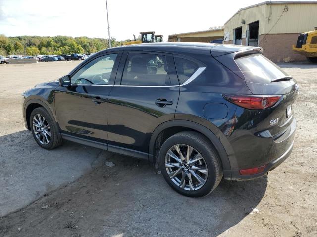 Photo 2 from auction – 2021 MAZDA CX-5 SIGNA with VIN JM3KFBEY0M0345138