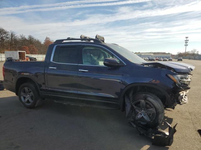 Photo 4 from auction – 2022 HONDA RIDGELINE with VIN 5FPYK3F75NB029951