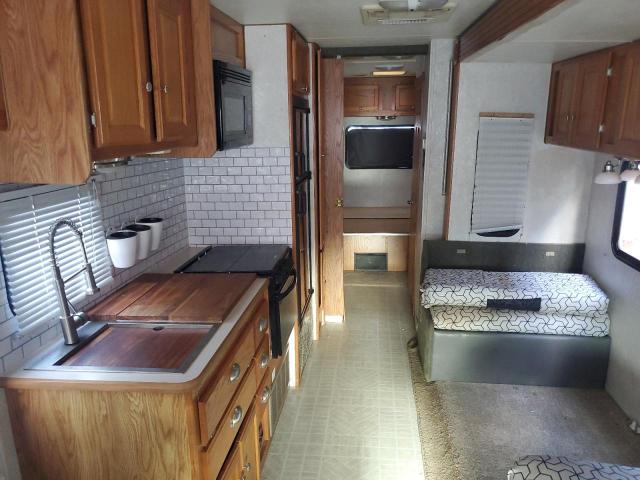 Photo 6 from auction – 2004 FORD ECON RV with VIN 1FDXE45S43HB78609