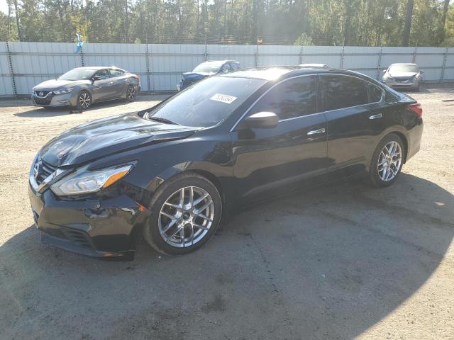 NISSAN ALTIMA 2.5 2016 with VIN 1N4AL3AP0GN385684 - Photo from auction