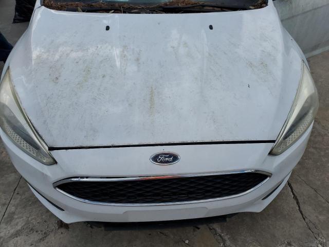 Photo 12 from auction – 2016 FORD FOCUS SE with VIN 1FADP3K21GL283651