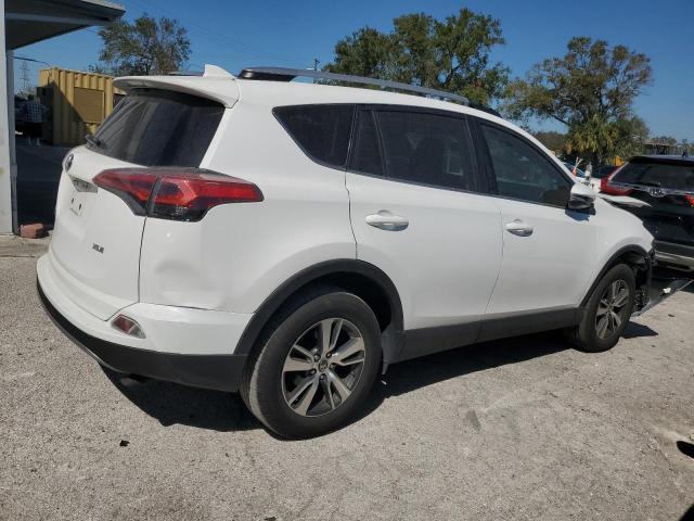 Photo 3 from auction – 2017 TOYOTA RAV4 XLE with VIN 2T3WFREVXHW320287