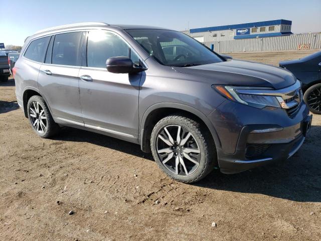 Photo 4 from auction – 2020 HONDA PILOT ELIT with VIN 5FNYF6H04LB025272