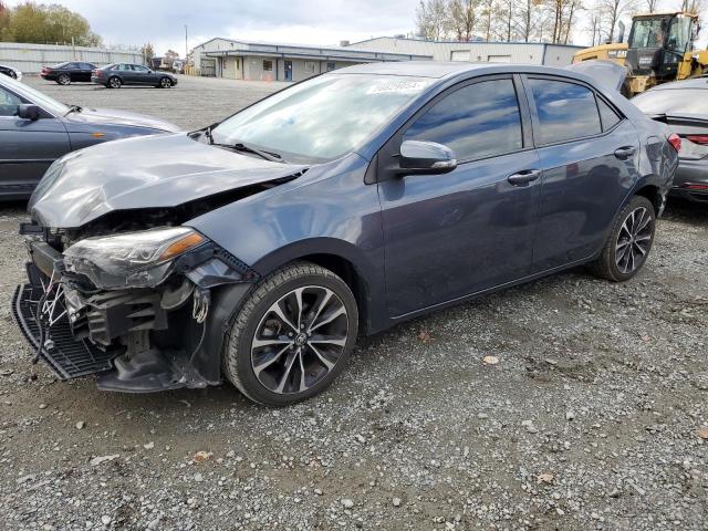 TOYOTA COROLLA L 2018 with VIN 5YFBURHE5JP753774 - Photo from auction