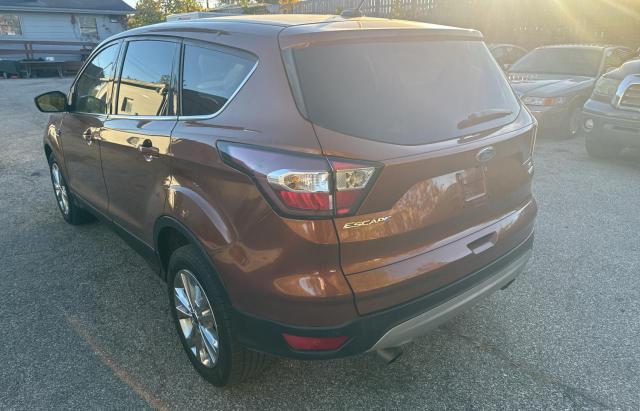Photo 3 from auction – 2017 FORD ESCAPE SE with VIN 1FMCU9GD0HUC27817
