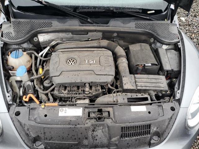 Photo 11 from auction – 2014 VOLKSWAGEN BEETLE with VIN 3VWF17AT1EM643208