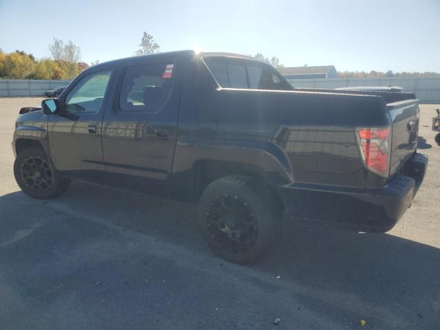 Фото 2 с аукциона – 2014 HONDA RIDGELINE с VIN 5FPYK1F52EB005562