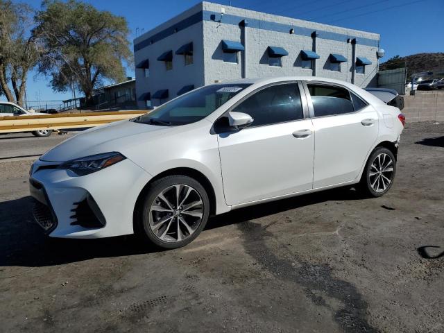 TOYOTA COROLLA L 2018 with VIN 5YFBURHE6JP845282 - Photo from auction