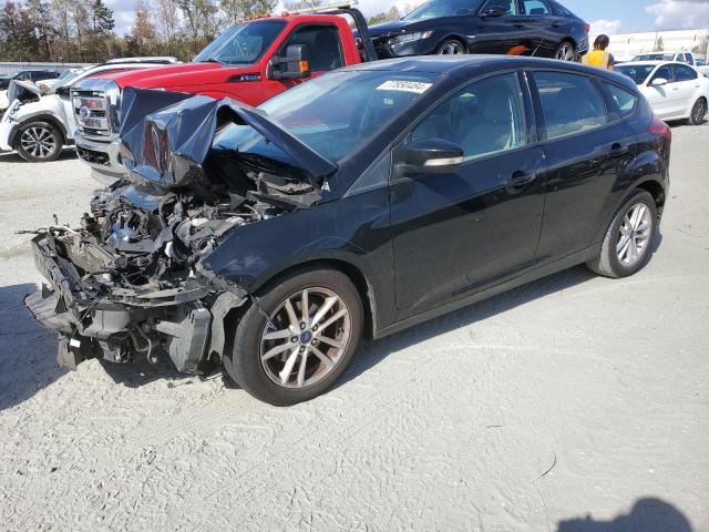 FORD FOCUS SE 2017 with VIN 1FADP3K23HL312584 - Photo from auction