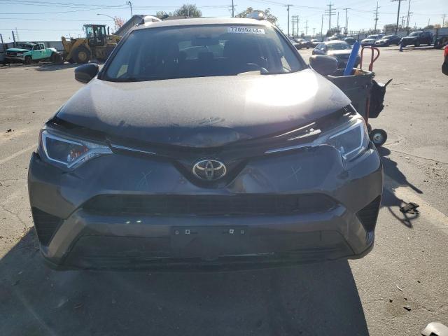 Photo 5 from auction – 2017 TOYOTA RAV4 LE with VIN JTMZFREV5HJ122292