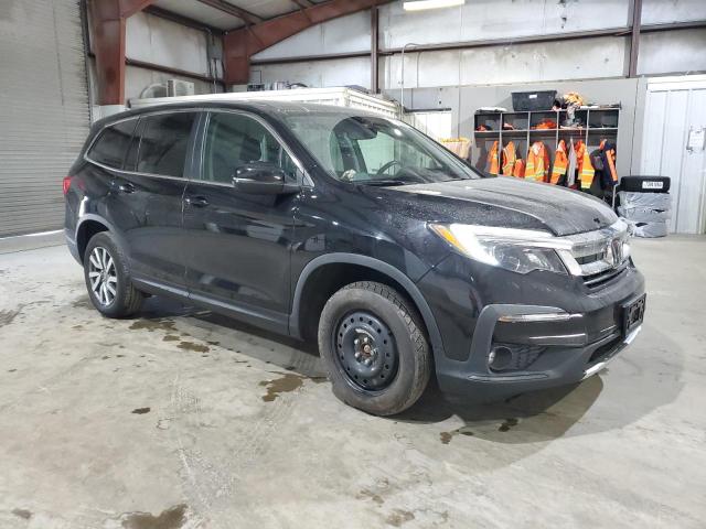 Photo 4 from auction – 2021 HONDA PILOT EXL with VIN 5FNYF6H57MB012352