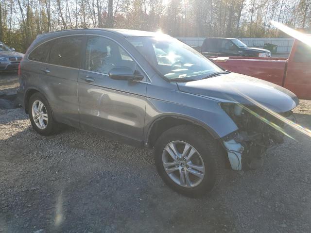 Photo 4 from auction – 2011 HONDA CR-V EXL with VIN JHLRE4H75BC028060