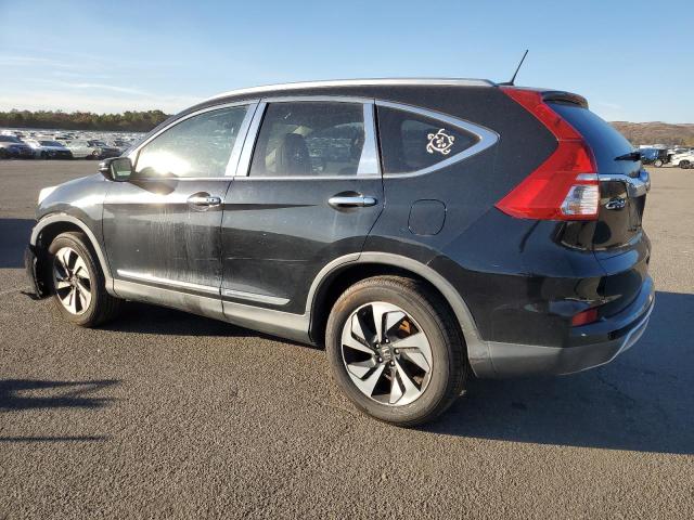 Photo 2 from auction – 2015 HONDA CR-V TOURI with VIN 5J6RM4H91FL063390