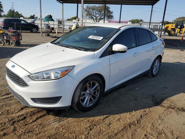 FORD FOCUS SE 2015 with VIN 1FADP3F23FL263488 - Photo from auction