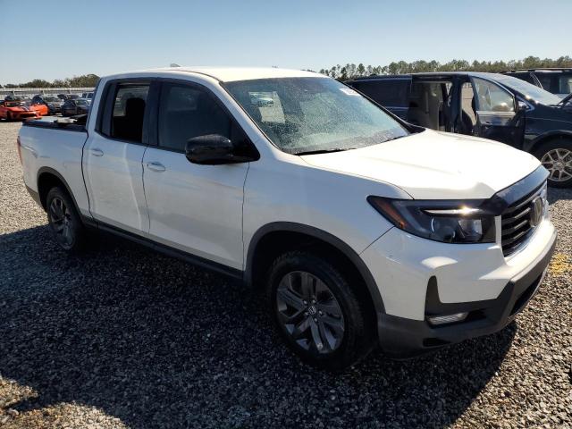 Photo 4 from auction – 2021 HONDA RIDGELINE with VIN 5FPYK3F19MB009521
