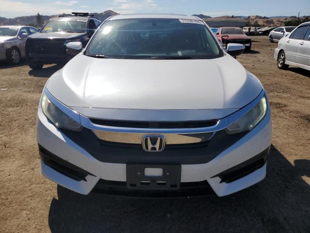 Photo 5 from auction – 2018 HONDA CIVIC EX with VIN 19XFC2F75JE202939