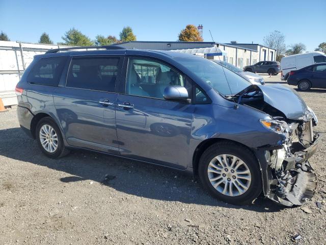 Photo 4 from auction – 2014 TOYOTA SIENNA XLE with VIN 5TDYK3DC6ES503748