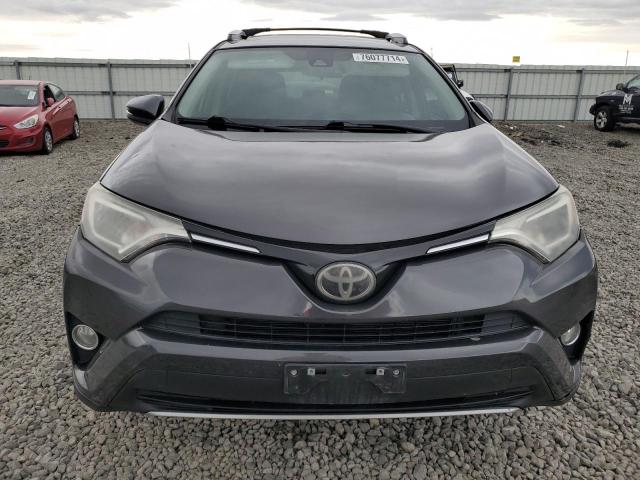 Photo 5 from auction – 2017 TOYOTA RAV4 XLE with VIN 2T3RFREV6HW556805