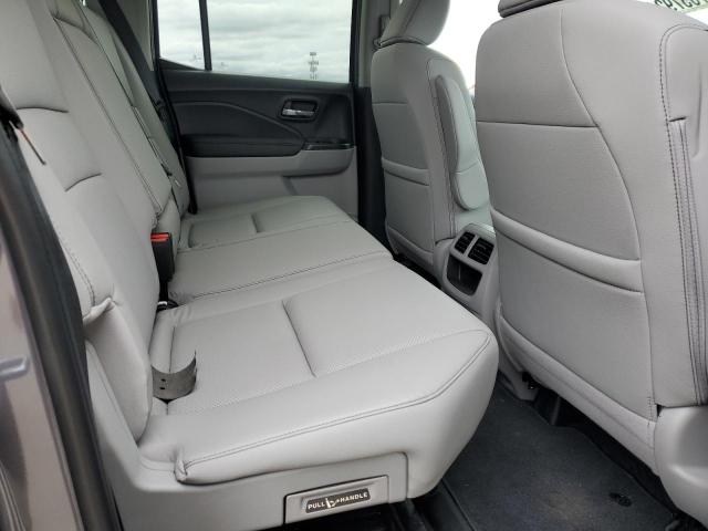 Photo 11 from auction – 2023 HONDA RIDGELINE with VIN 5FPYK3F58PB067451