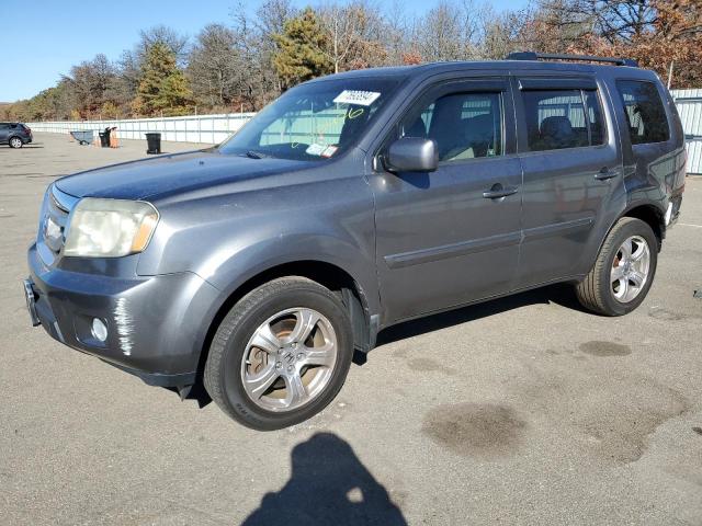HONDA PILOT EXL 2011 with VIN 5FNYF4H53BB052476 - Photo from auction
