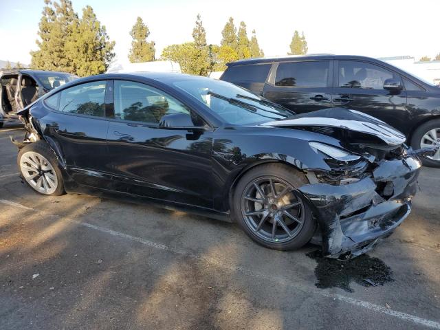 Photo 4 from auction – 2023 TESLA MODEL 3 with VIN 5YJ3E1EA8PF460363